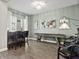 Spacious Living room featuring a bar and a shuffleboard table at 645 American Holly Pl, Oviedo, FL 32765