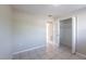 Bedroom with closet and tile flooring throughout at 73 Channing Ave, Orlando, FL 32811