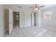 Bedroom featuring a ceiling fan and a closet at 73 Channing Ave, Orlando, FL 32811