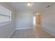 Bright living room with tile floors and ample natural light at 73 Channing Ave, Orlando, FL 32811