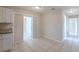 View of the living room and the adjacent hallways at 73 Channing Ave, Orlando, FL 32811