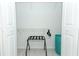 Closet features double doors, with wire shelving and a luggage rack inside at 7834 Turkey Oak Ln, Kissimmee, FL 34747