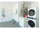 Laundry room with washer/dryer set, furnace and breaker box at 7834 Turkey Oak Ln, Kissimmee, FL 34747