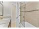 Updated bathroom featuring a tiled shower, glass enclosure, and modern fixtures at 801 Fox Valley Dr, Longwood, FL 32779