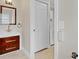 Modern bathroom with vanity and a door to additional space at 801 Fox Valley Dr, Longwood, FL 32779