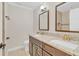 Beautiful bathroom features a double vanity, granite countertops, and stylish fixtures at 801 Fox Valley Dr, Longwood, FL 32779
