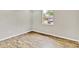 Bedroom with hardwood floors and a view of the yard at 801 Fox Valley Dr, Longwood, FL 32779