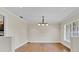 Light-filled dining room featuring hardwood floors and neutral paint at 801 Fox Valley Dr, Longwood, FL 32779