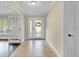 Inviting entryway featuring tiled floors, neutral paint, and ample natural light at 801 Fox Valley Dr, Longwood, FL 32779