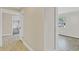 Hallway featuring hardwood floors and neutral paint at 801 Fox Valley Dr, Longwood, FL 32779