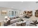 Open living space featuring a view of the pool and a dining area adjacent to the kitchen at 801 Fox Valley Dr, Longwood, FL 32779