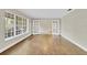 Spacious living room featuring hardwood floors and large windows with natural light at 801 Fox Valley Dr, Longwood, FL 32779