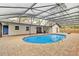 Enclosed pool area featuring a pool, patio, and outdoor seating at 801 Fox Valley Dr, Longwood, FL 32779