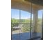 View from balcony with lovely greenery and a patio with a view at 8775 Sartori St # 302, Orlando, FL 32829