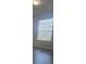 Bedroom featuring neutral paint and natural light at 8775 Sartori St # 302, Orlando, FL 32829