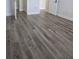 Stylish, wood-look flooring enhances this home's interior appeal at 8775 Sartori St # 302, Orlando, FL 32829