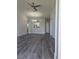 Living room with wood look floors at 8775 Sartori St # 302, Orlando, FL 32829