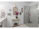 Modern bathroom with a glass-enclosed shower, vanity area, and contemporary decor at 944 Flyer St, Orange City, FL 32763