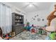 Whimsical bedroom with playful decorations and a cozy bed, perfect for children at 944 Flyer St, Orange City, FL 32763