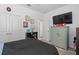 Comfortable bedroom with closet doors, TV, and playful decorations for a cozy space at 944 Flyer St, Orange City, FL 32763