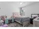 Bright bedroom with a comfortable bed, vanity area, and ample natural light at 944 Flyer St, Orange City, FL 32763