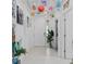 Inviting entryway featuring tile flooring, a decorated door, and a potted plant at 944 Flyer St, Orange City, FL 32763