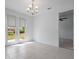 The dining area features recessed lighting and access to the backyard at 1030 Alabaster Way, Deltona, FL 32725