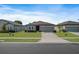 Charming single-story home with a well-maintained lawn and inviting curb appeal at 1030 Alabaster Way, Deltona, FL 32725