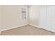 Cozy bedroom with neutral carpet, a window with blinds, and a closet at 1162 Lebanon Ct, Sanford, FL 32771