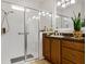 Bathroom showcasing a glass shower and a spacious countertop at 1390 Harbor Ridge Dr, Kissimmee, FL 34759