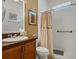 Well-lit bathroom with modern fixtures and accessible shower at 1390 Harbor Ridge Dr, Kissimmee, FL 34759