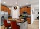 Modern kitchen with stainless steel appliances and granite countertops at 1390 Harbor Ridge Dr, Kissimmee, FL 34759