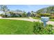 Well maintained front lawn leading to a charming home with a mailbox at 203 Prestwick Dr, New Smyrna Beach, FL 32168