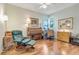 Cozy living room space featuring wooden furniture and bright windows at 203 Prestwick Dr, New Smyrna Beach, FL 32168