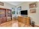 Cozy living room space featuring wooden furniture and bright windows at 203 Prestwick Dr, New Smyrna Beach, FL 32168