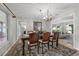 Charming dining room featuring a wood table, seating for eight, and access to other rooms at 222 Yarmouth Rd, Fern Park, FL 32730