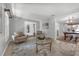 Inviting living room with tile flooring, stylish seating, and an open layout at 222 Yarmouth Rd, Fern Park, FL 32730