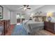 Serene main bedroom with French doors, stylish furniture, and a calming atmosphere for relaxation at 222 Yarmouth Rd, Fern Park, FL 32730