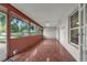 Sun room with tile flooring, plants, windows and fan at 222 Yarmouth Rd, Fern Park, FL 32730