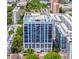 Magnificent building featuring a rooftop pool and expansive windows, offering luxurious urban living at 260 Osceola Ave # 902, Orlando, FL 32801