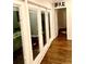 Open bar area with hardwood floors and a view to the outdoor living space at 750 Hempstead Ave, Orlando, FL 32803