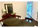 Open bar area with large granite table and chairs next to the door to outdoor living space at 750 Hempstead Ave, Orlando, FL 32803