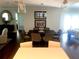 Formal dining room with chandelier and hardwood floors at 750 Hempstead Ave, Orlando, FL 32803