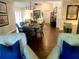 Spacious living room showcases an open floor plan with eat-in kitchen and dining area at 750 Hempstead Ave, Orlando, FL 32803