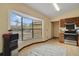 Bright kitchen nook featuring a large window with blinds at 1037 Parnell Ct, Deltona, FL 32738