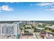 Expansive city view highlighting the urban skyline against a bright blue sky, showcasing the area's unique mix of modern and historical architecture at 155 S Court Ave # 2708, Orlando, FL 32801