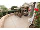 Inviting outdoor patio area featuring comfortable seating and a retractable awning for shade at 1669 Plum Branch Ter, The Villages, FL 32162