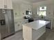 Modern kitchen with stainless steel appliances and a center island at 2451 W 18Th St, Sanford, FL 32771