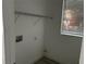 Compact laundry room with a window at 2451 W 18Th St, Sanford, FL 32771