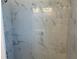 Close-up of a tiled shower featuring elegant marble-look tiles at 2451 W 18Th St, Sanford, FL 32771